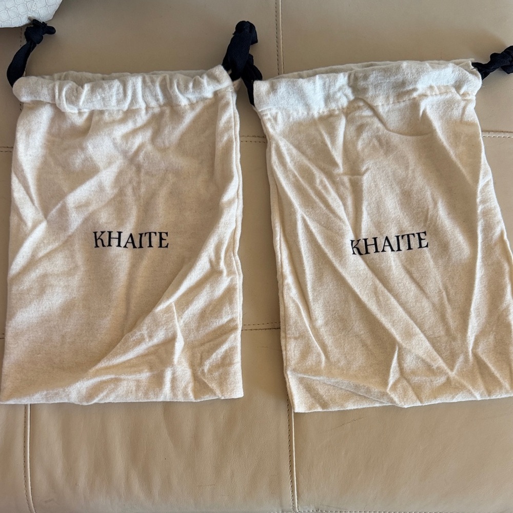 KHAITE Cream Drawstring Bags